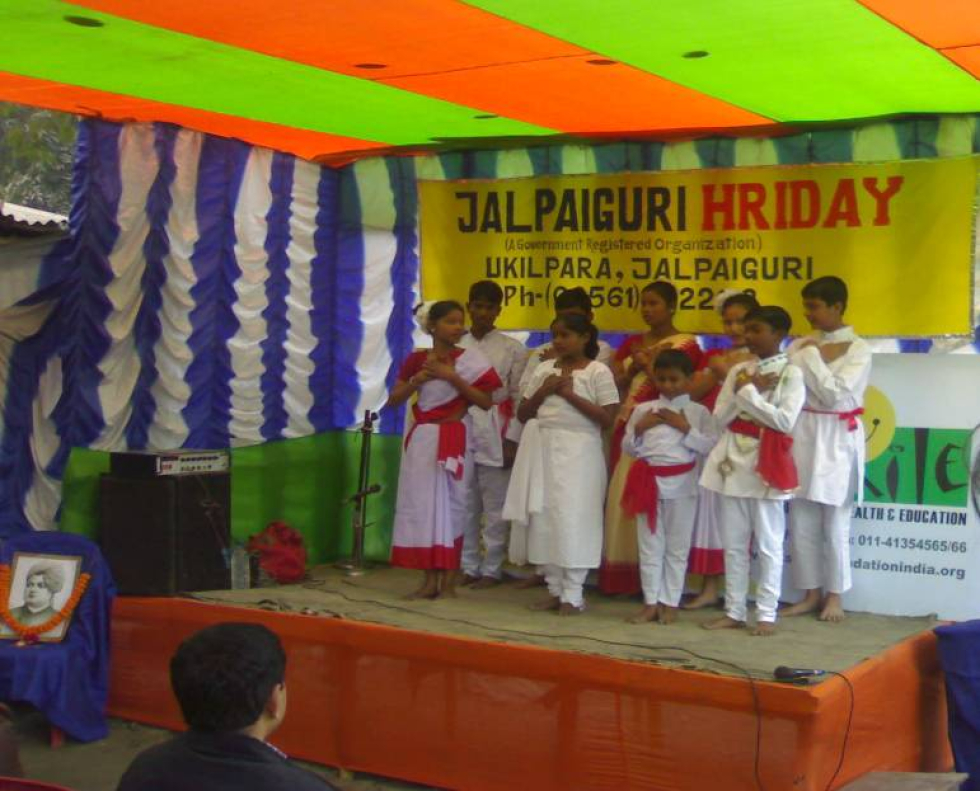 A group dance by children at the event