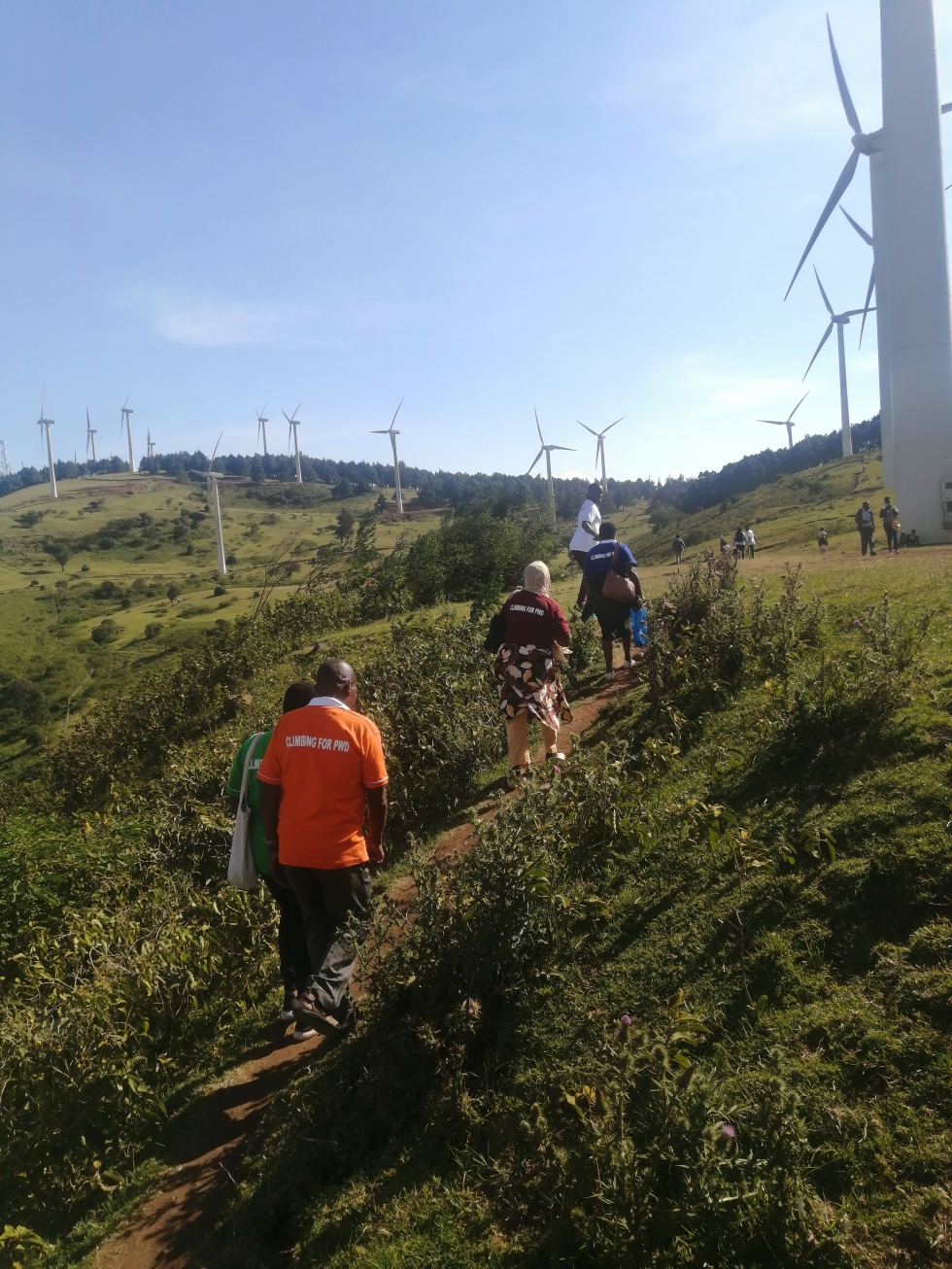 Participants in action, climbing the first hill