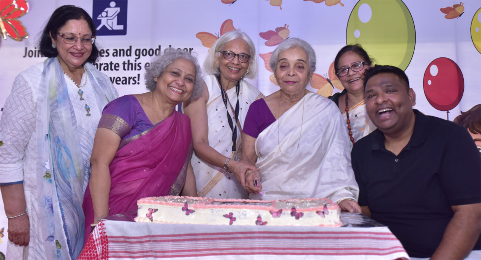 The cutting of the cake (notice the butterflies)