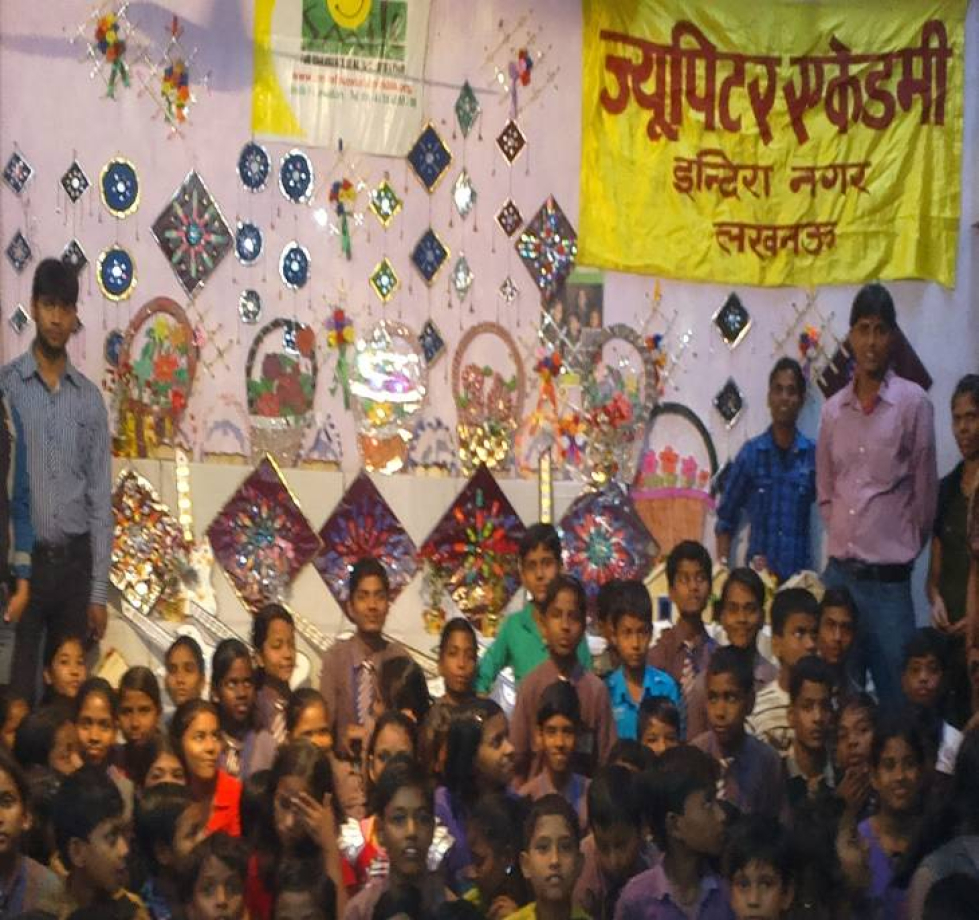 The children of Jupiter Academy with their products