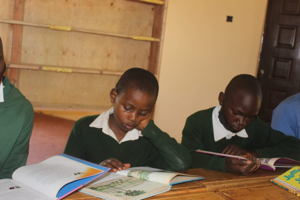 Pupils using the library