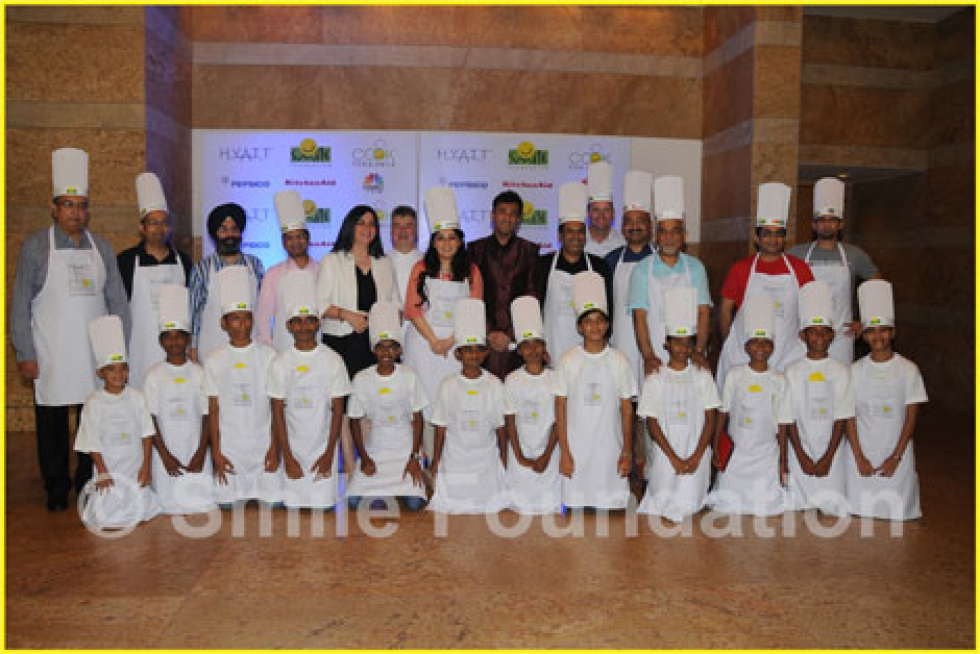 Chef Vikas Khanna along with 12 corporate leaders and participating kids at Grand Hyatt, Mumbai