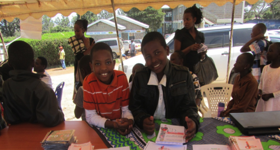 Children fundraising outside a local church