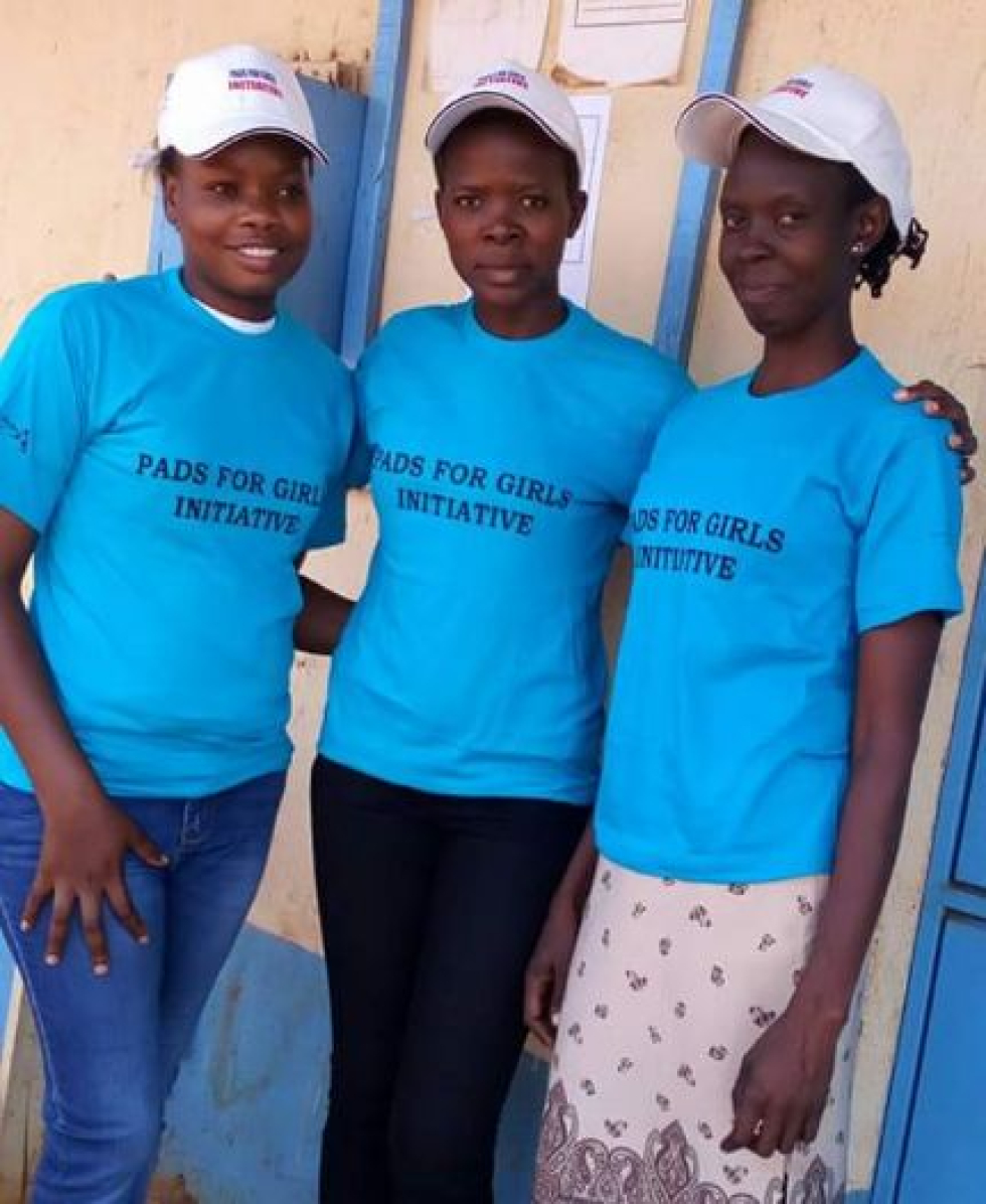 Dhamira Moja fundraising team in Pads 4 Girls Initiative T-shirts and Caps