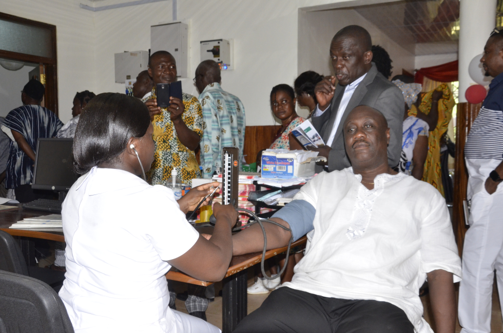 Community leaders visiting an outpatient clinic