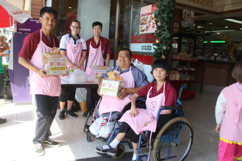 One of the teams outside 'their' shop