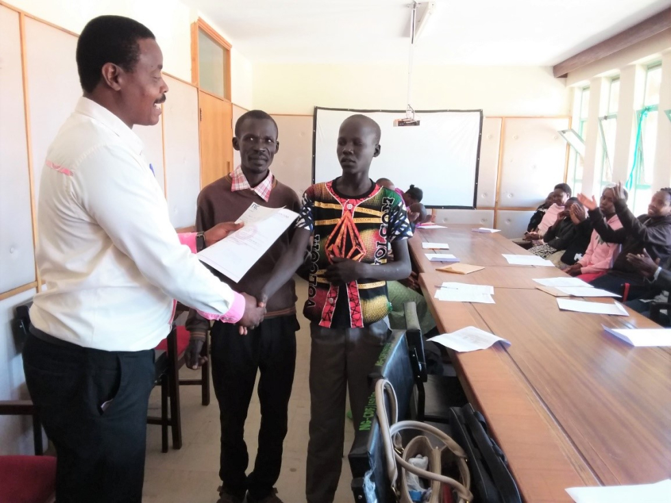 Scholarship recipients receiving their awards