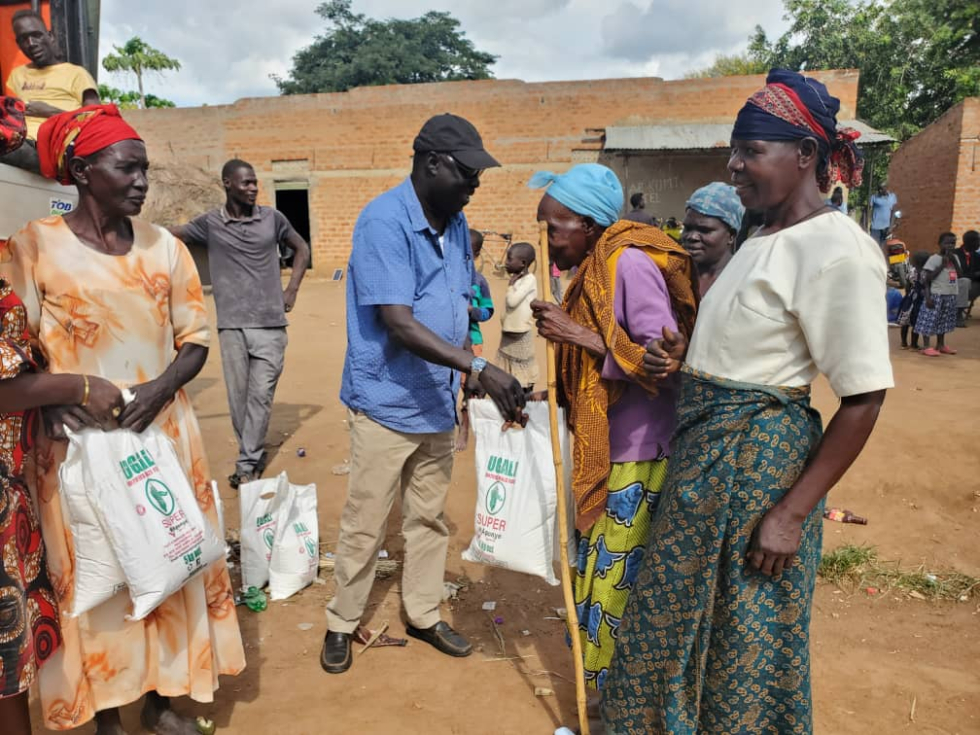 Elders receiving maize flour